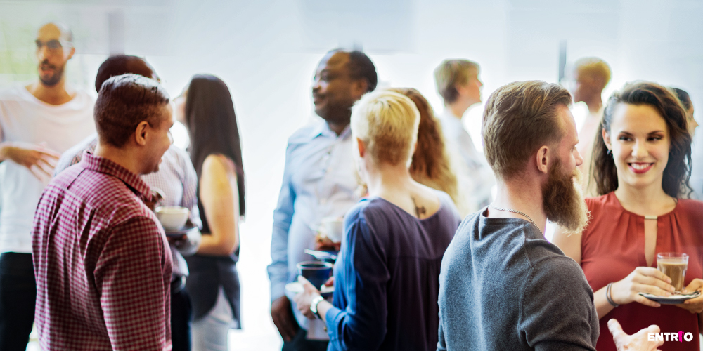 Business people mingling and networking over drinks after an event such as conference or a workshop